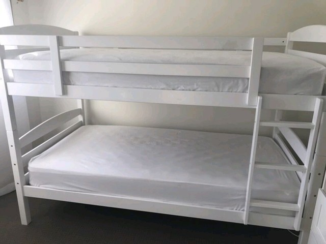 white bunk beds with mattress included